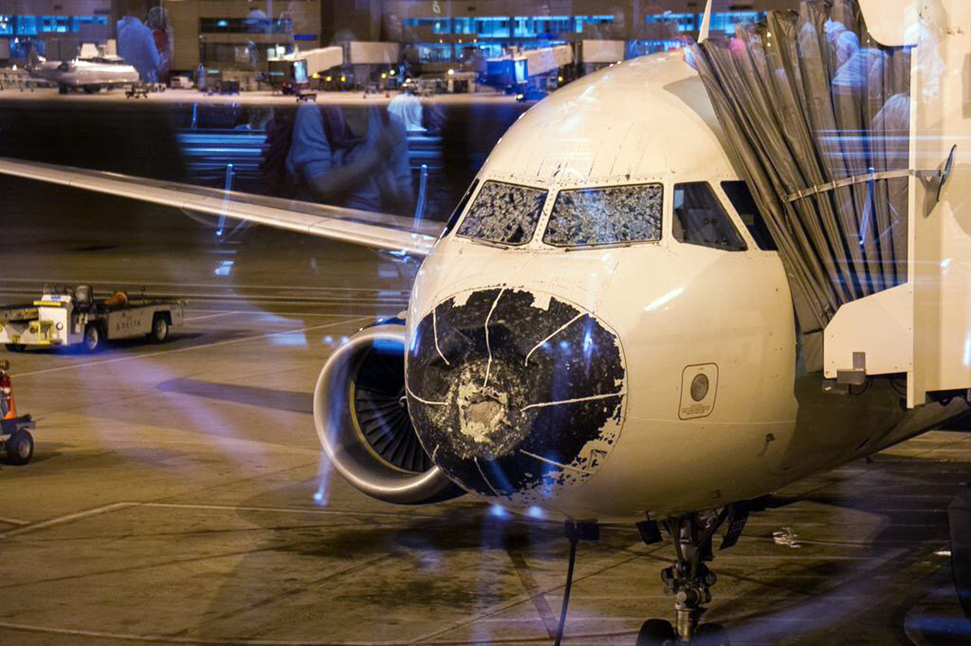 World News Delta airliner makes emergency landing after hail storm