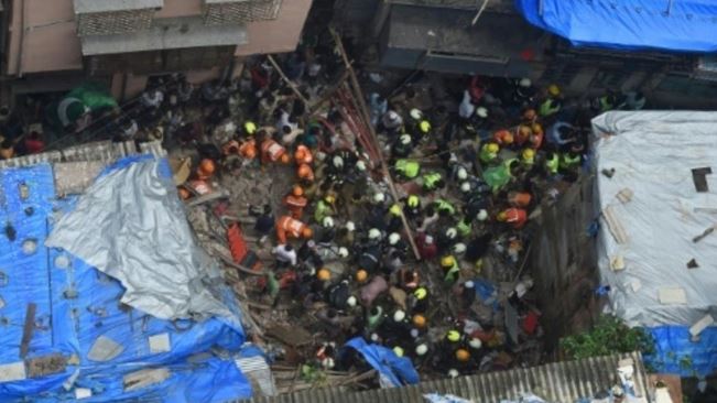 World News: Two dead, over 40 trapped in Mumbai building collapse