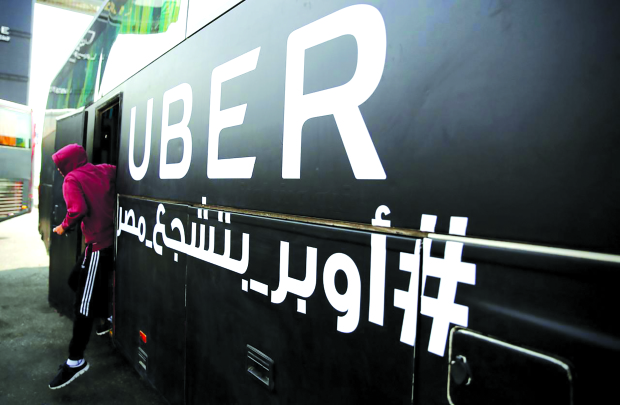 International Business: Egypt watchdog approves Uber acquisition