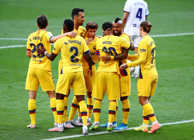 Football: Sloppy Barca grind out win over Valladolid to ...
