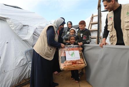 Kuwait charity aids needy families in seven...