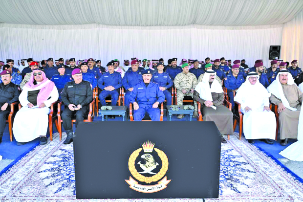 The Interior Minister with officials at the event