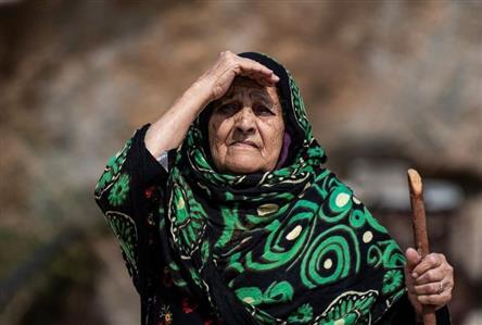 Elderly woman in mountainous Maysan recalls...