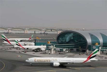Dubai Airport partially resumes operations after...