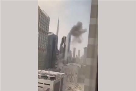 Debris falls on building after interception...