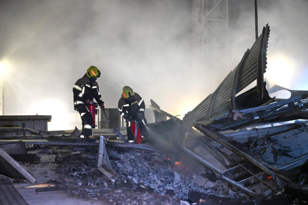 Civil Defence teams at the site yesterday.