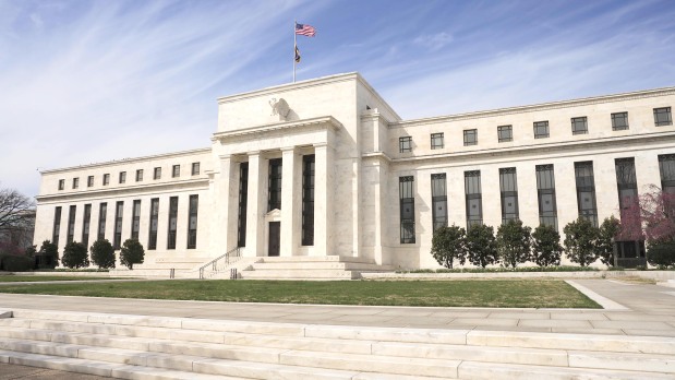 International Business : US stocks face test from Fed Reserve decision