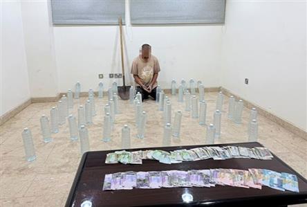 Police unearth underground liquor stash in Kuwait...