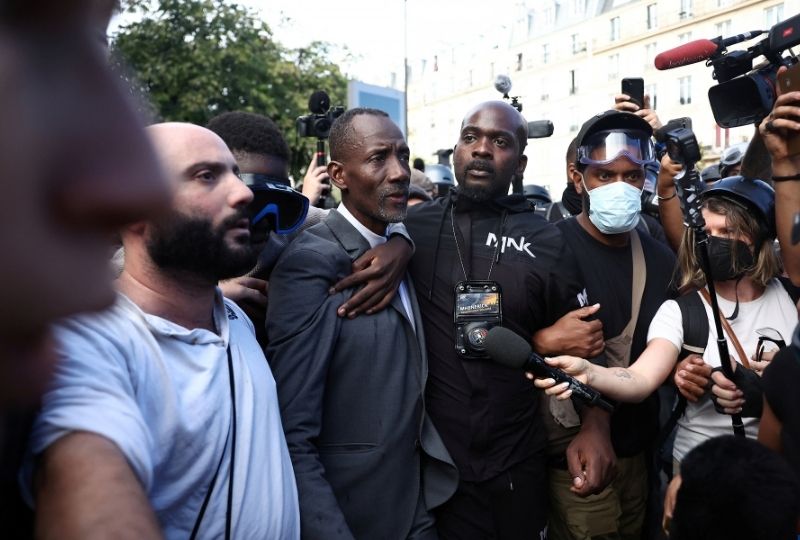 World News: Paris suburb mayor acts as human shield to protect student ...