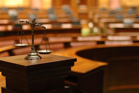 Surgeon exonerated over death of cancer patient...